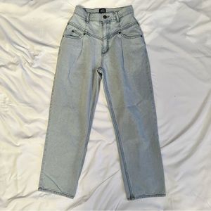UO BDG light western style jeans with V below the waistline on front and back